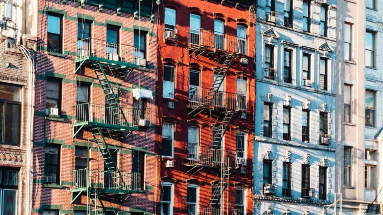 Historic Buildings in Manhattan front look, blue paint wall, red paint wall, red bricks wall